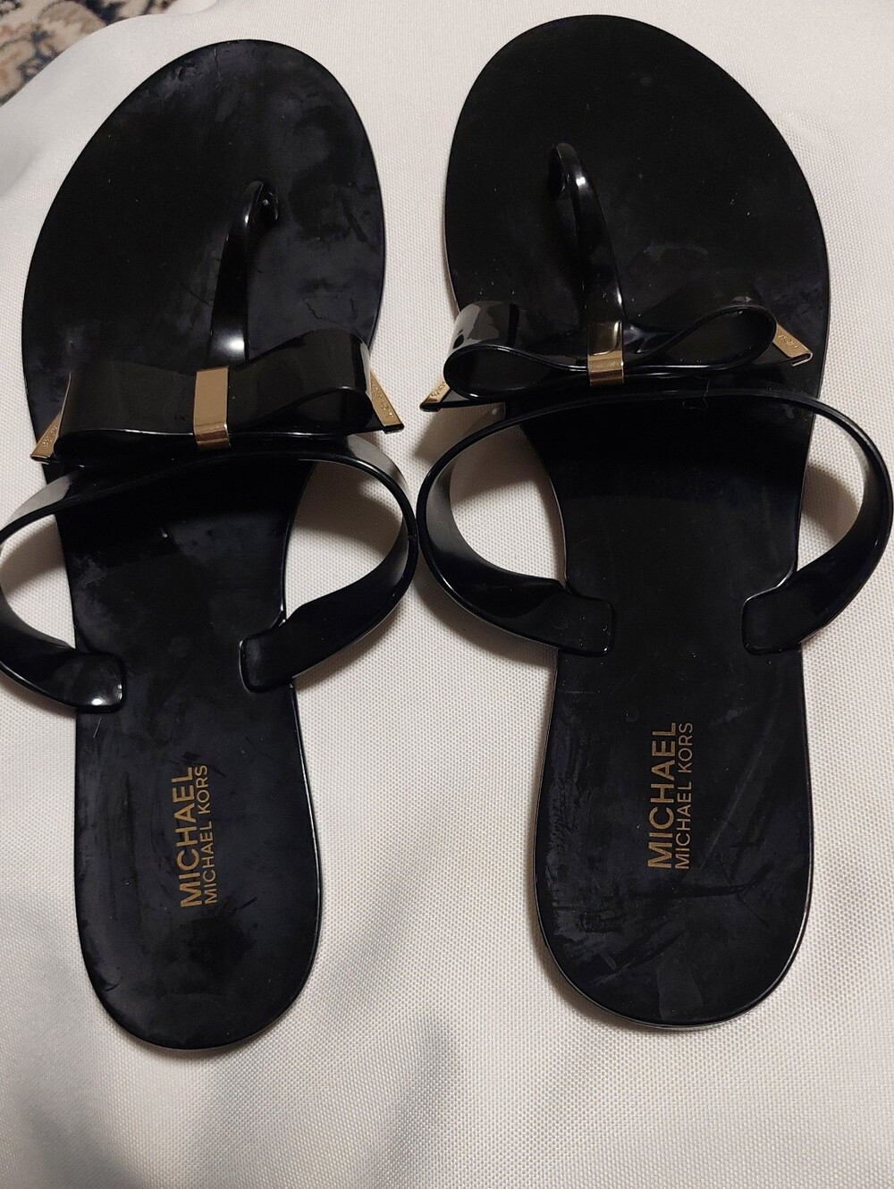 Michael Kors Black Patent Bow Jelly Sandals with Gold Accent
